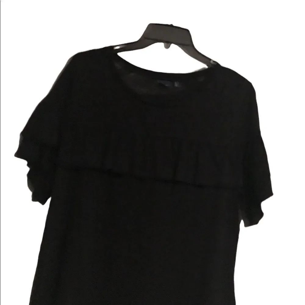 Kaari Blue size large perfect condition black ruffled top